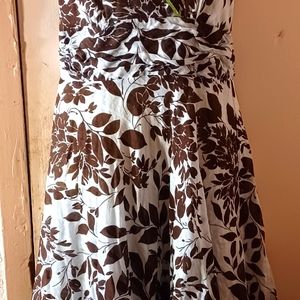 SZ 10 brown Floral on white white with lime green trim in Marilyn Monroe style.